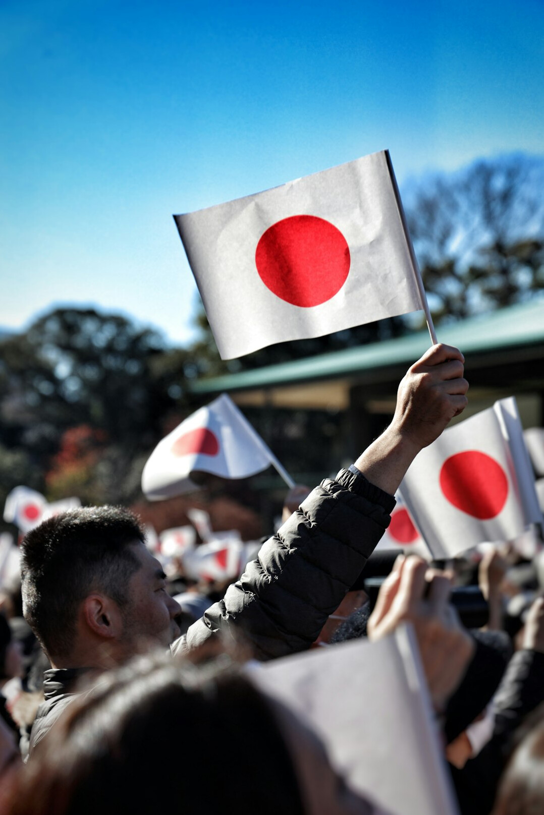 japanese fans holding signs
